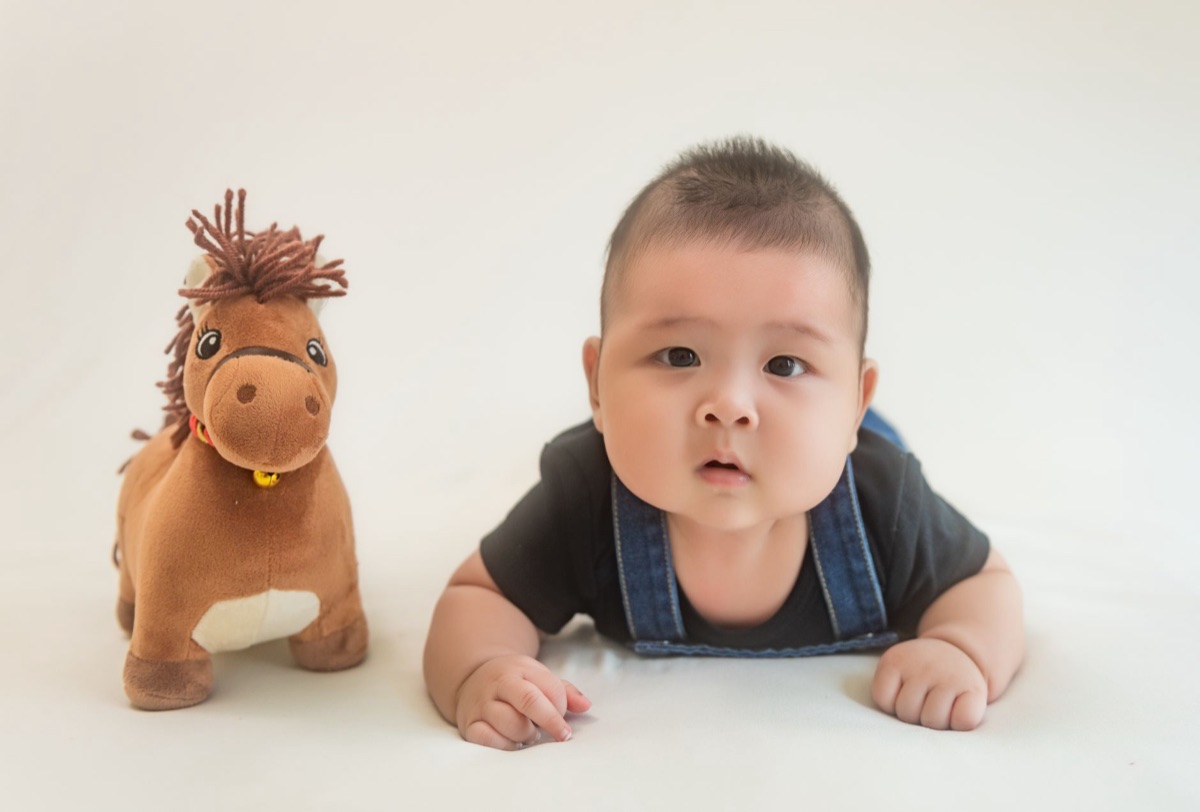 thai baby with toy