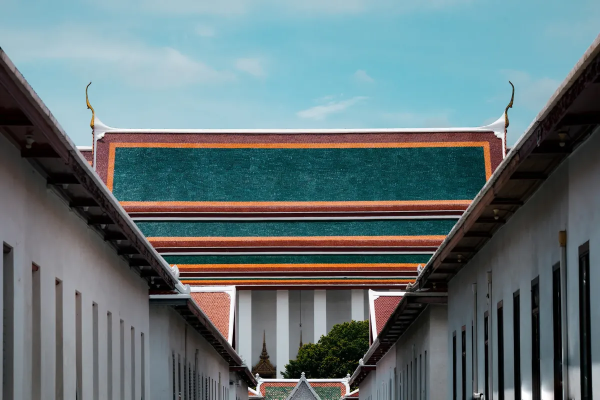 Beautiful Thai architecture showcasing vibrant roof colors in Bangkok, Thailand.