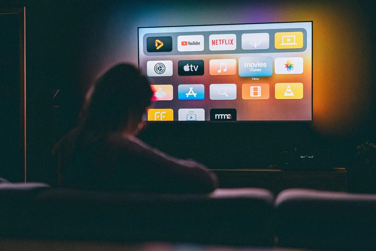 applications, tv, watching, girl, woman, television, dark room, screen, youtube, netflix, apple tv, entertainment, recreation, movies, series, netflix, netflix,